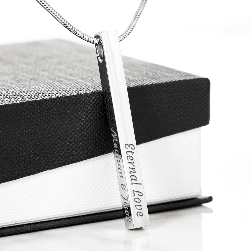 To My Wife - 4-Sided Stick Necklace, engraved pendant propped on a gift box, no card