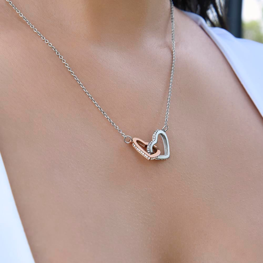 To My Daughter - Interlocking Hearts Necklace, close-up on a model
