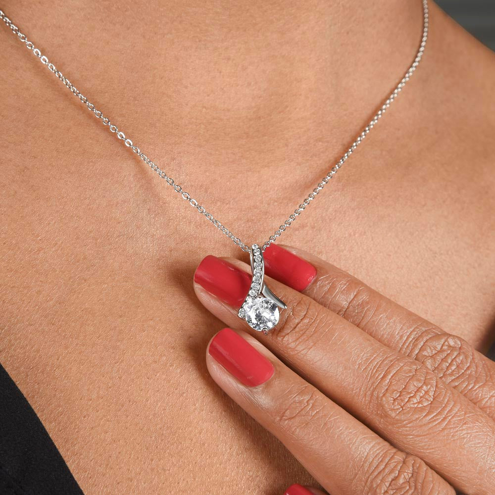To My Wife - Alluring Beauty Necklace, worn close up with a hand resting on the pendant